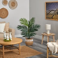 4ft. Kentia Palm Artificial Tree in Boho Chic Handmade Natural Cotton Woven Planter with Tassels