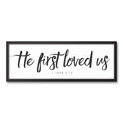 He First Loved Us 37.73" x 13.73" Black Framed Canvas