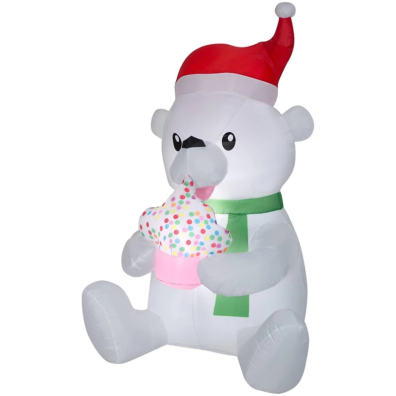 5.5ft. Animated Airblown® Inflatable Nom Nom Polar Bear with Cupcake