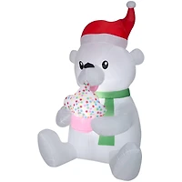 5.5ft. Animated Airblown® Inflatable Nom Nom Polar Bear with Cupcake