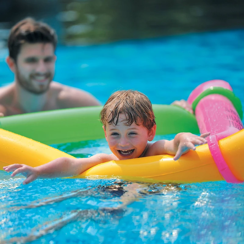 Pool Central® 6ft. Inflatable Purple & Yellow Dinosaur Twisty Tube Pool Toy Set