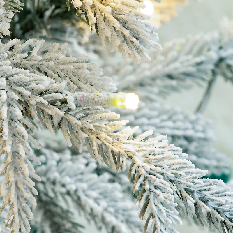 8ft. Pre-Lit Deluxe Flocked Fir Artificial Christmas Tree, Warm White Lights