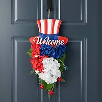 Glitzhome® 22.5" Patriotic Americana Metal Top Hat & Hydrangea Swag Wall Décor