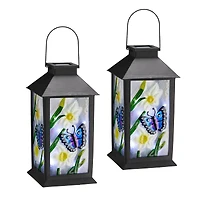 Glitzhome® 11" Glass with Butterfly & Flower Pattern Solar Powered Hanging Lanterns, 2ct.