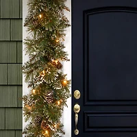 6' x 10" Pre-lit Glittery Bristle® Pine Artificial Christmas Garland with Cones & 50 Battery Operated Soft White LED Lights