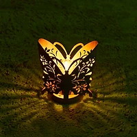 Glitzhome® 9" Metal Flying Butterfly Silhouette Solar Powdered Edison Bulb Outdoor Lanterns, 2ct.