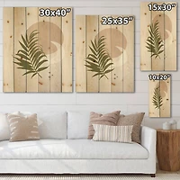 Designart - Abstract Sun and Moon With Green Leaf II