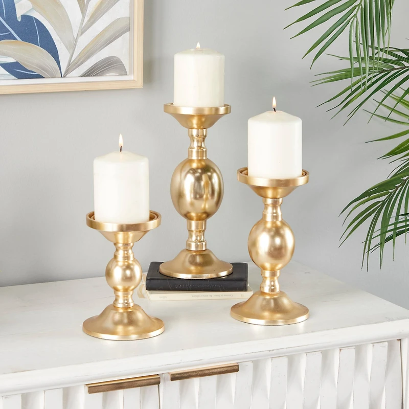 The Novogratz Set of 3 Gold Aluminum Transitional Candle Holders, 10" x 4" x 4"