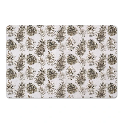 Pinecones on White Floor Mat