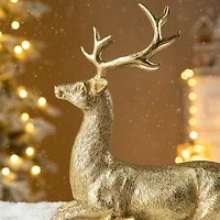Glitzhome® 11" Lying Reindeer Table Décor