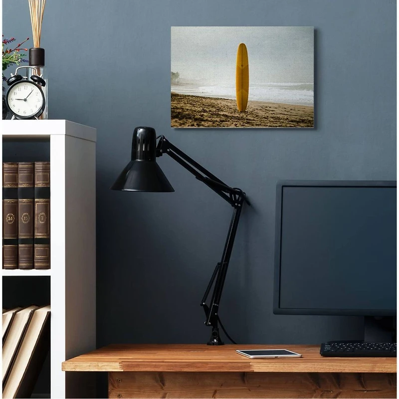Stupell Industries Yellow Surfboard in Sand Canvas Wall Art