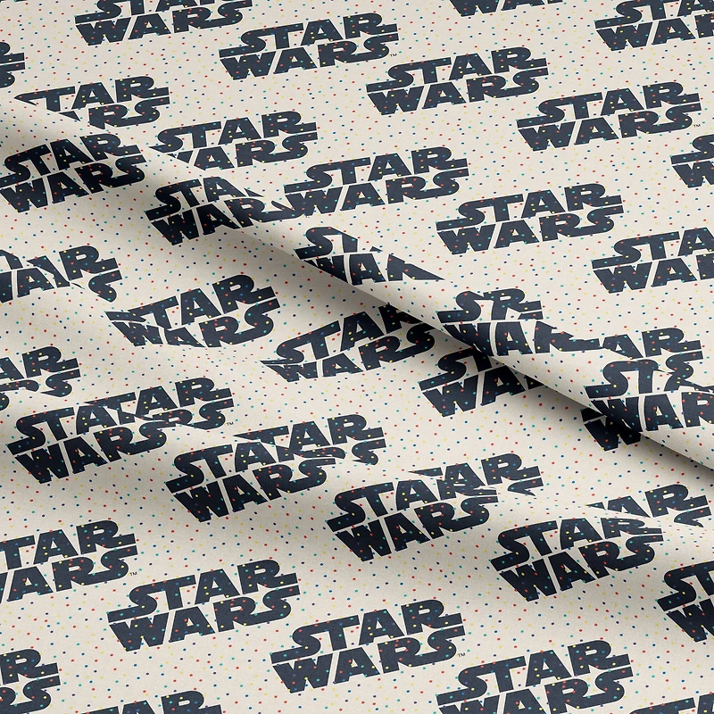 Star Wars™ Logo & Tiny Dots on Cream Cotton Fabric