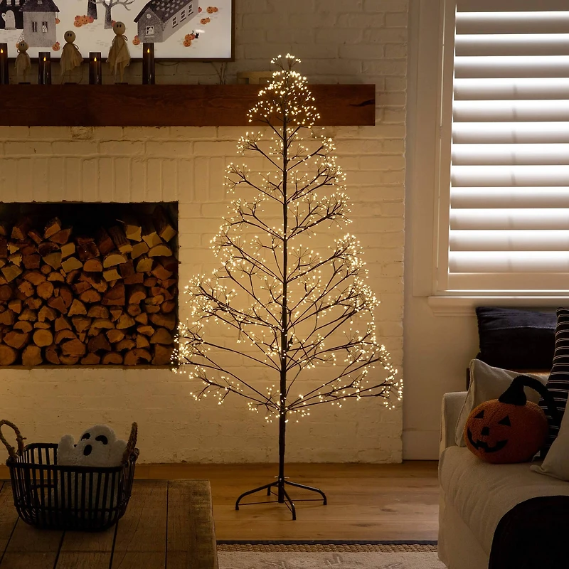 6ft. Pre-Lit Artificial Halloween Black Starburst Tree with 1680 Fairy Warm White LED Lights