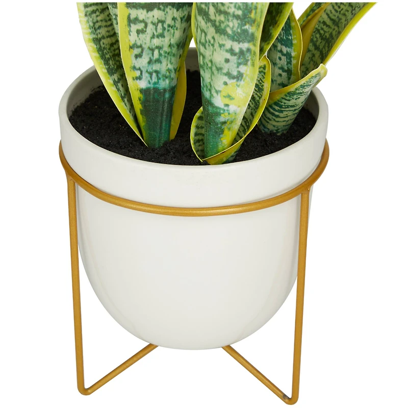 The Novogratz 25" Green Snake Faux Foliage Artificial Plant with White Porcelain Pot and Gold Stand