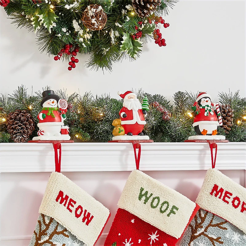 Glitzhome® 7" Santa, Snowman & Penguin Stocking Holder Set