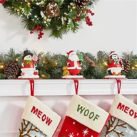 Glitzhome® 7" Santa, Snowman & Penguin Stocking Holder Set
