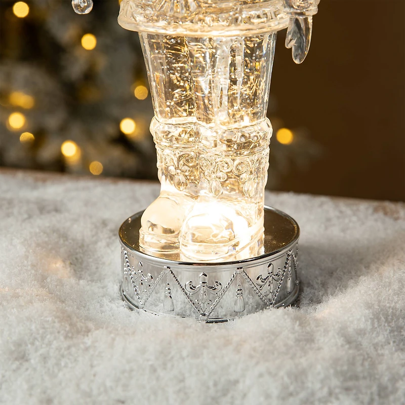 Glitzhome® 12.5" Lighted Acrylic Crystal Nutcracker Figurine Waterglobe