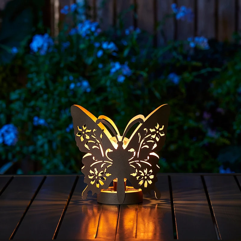 Glitzhome® 9" Metal Flying Butterfly Silhouette Solar Powdered Edison Bulb Outdoor Lantern