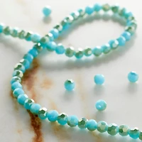 12 Pack: Aqua Mix Small Glass Faceted Round Beads, 3mm by Bead Landing™