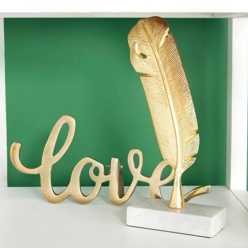 CosmoLiving by Cosmopolitan 12" Gold Aluminum Feather Sculpture