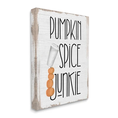 Stupell Industries Pumpkin Spice Junkie Phrase Balancing Coffee Cup Canvas Wall Art