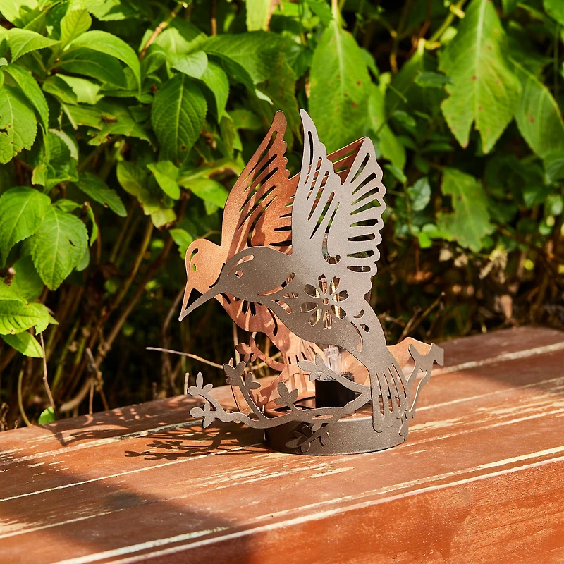 Glitzhome® 9.75" Metal Flying Hummingbird Silhouette Solar Powered Edison Bulb Outdoor Lanterns, 2ct.