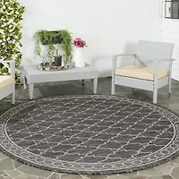 Safavieh Courtyard Collection Keeley Geometric Indoor/Outdoor Round Area Rug