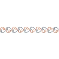 1/10 CT. T.W. Natural White Diamond Heart 7.5 Inch Tennis Bracelet in 14K Gold Over Silver