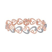 1/10 CT. T.W. Natural White Diamond Heart 7.5 Inch Tennis Bracelet in 14K Gold Over Silver