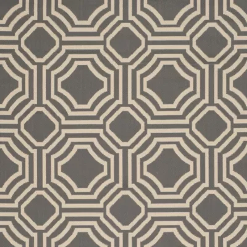 Safavieh Courtyard Collection Torma Geometric Indoor/Outdoor Round Area Rug