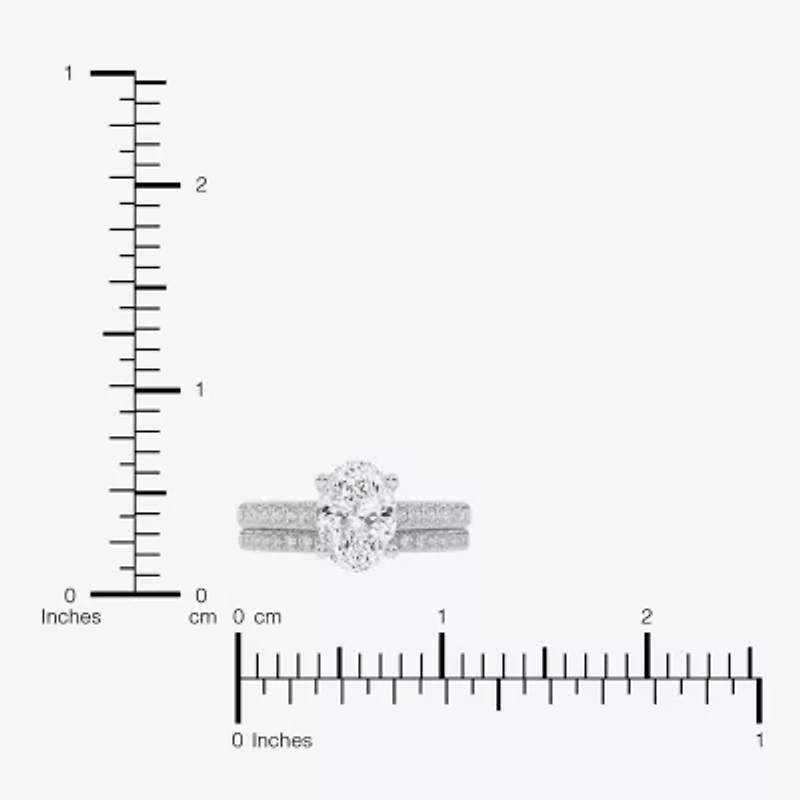 (G / Vs2-Si1) Womens 3 1/2 CT. T.W Lab Grown White Diamond 10K Gold Oval Side Stone Bridal Set