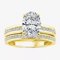 (F / Vs2) Womens 2 1/2 CT. T.W. Lab Grown White Diamond 14K Gold Oval Side Stone Bridal Set
