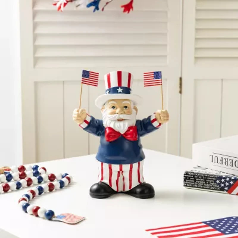 Glitzhome 9" Santa Holding Flags
