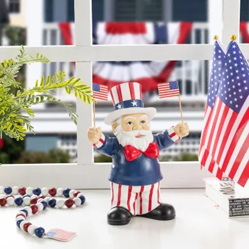 Glitzhome 9" Santa Holding Flags