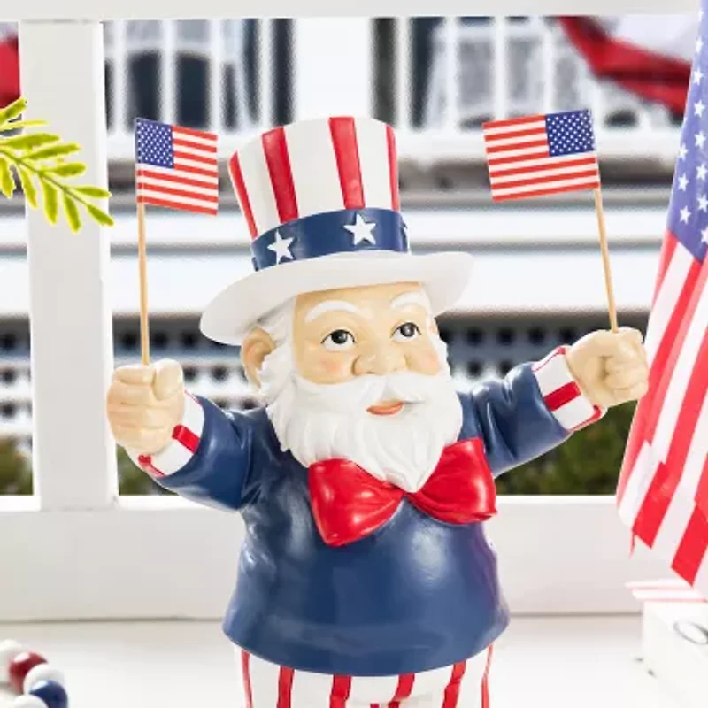 Glitzhome 9" Santa Holding Flags
