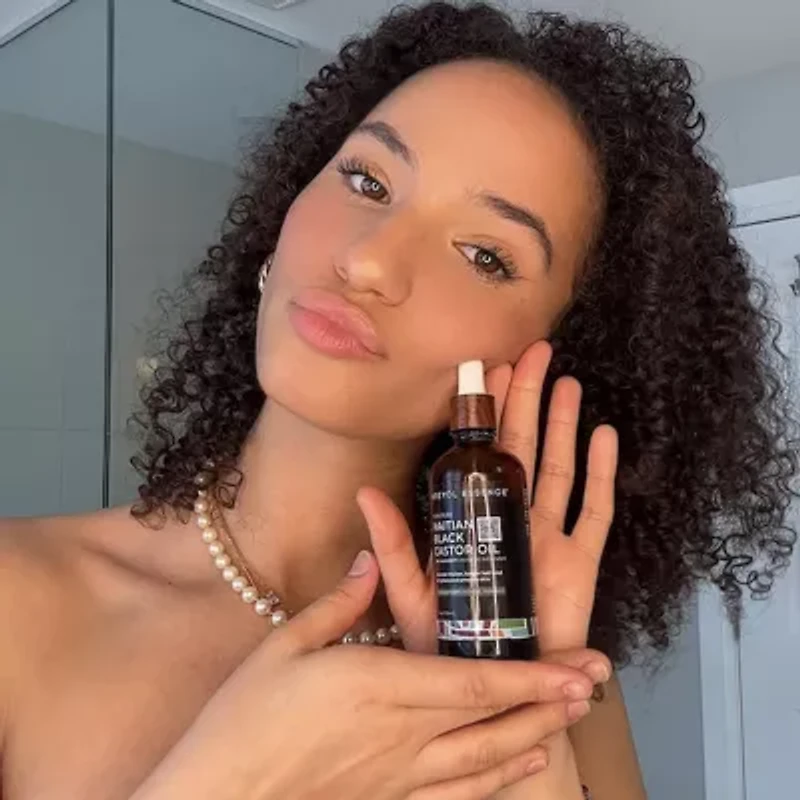 Kreyol Essence Haitain Black Castor Rosemary Peppermint Hair Oil 2 oz.