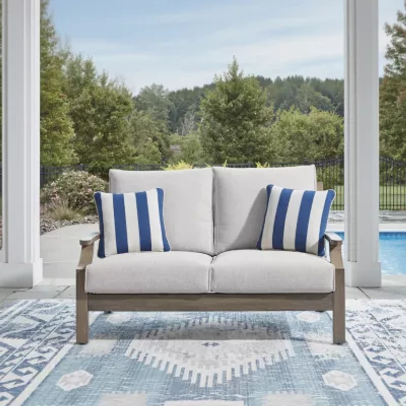 Signature Design by Ashley Raleigh Ranch Outdoor Loveseat with Cushion