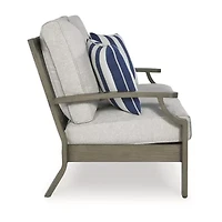 Signature Design by Ashley Raleigh Ranch Outdoor Loveseat with Cushion