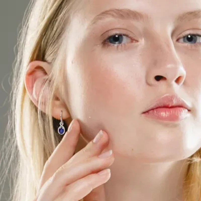 Genuine Sapphire and 1/4 CT. T.W. Diamond Leverback Earrings