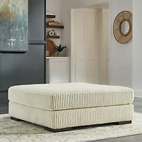 Signature Design by Ashley® Lindyn Cushioned Upholstered Ottoman