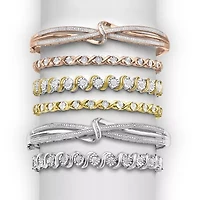 1/10 CT. T.W. Diamond Crossover Bangle Bracelet Sterling Silver or 14K Gold Over