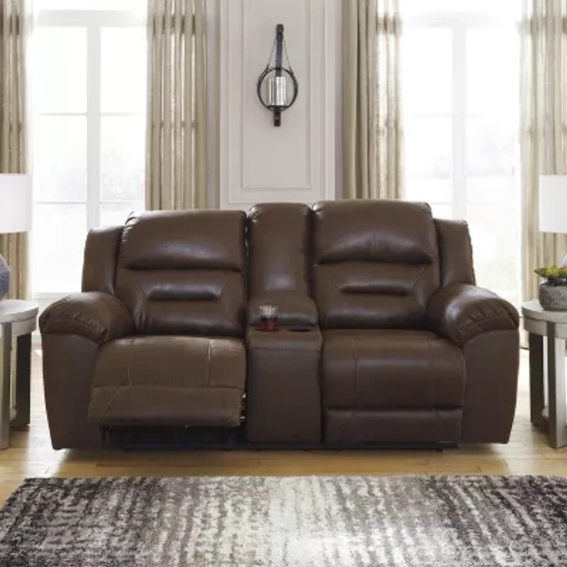 Signature Design by Ashley® Stoneland Manual Reclining Loveseat with Console