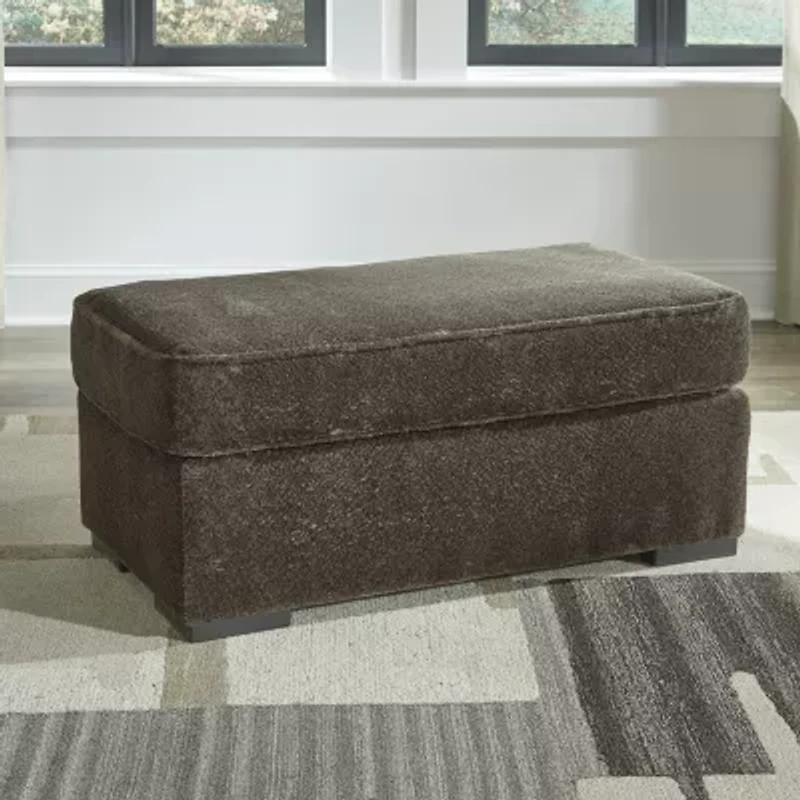 Signature Design by Ashley Aylesworth Ottoman in Dark Brown