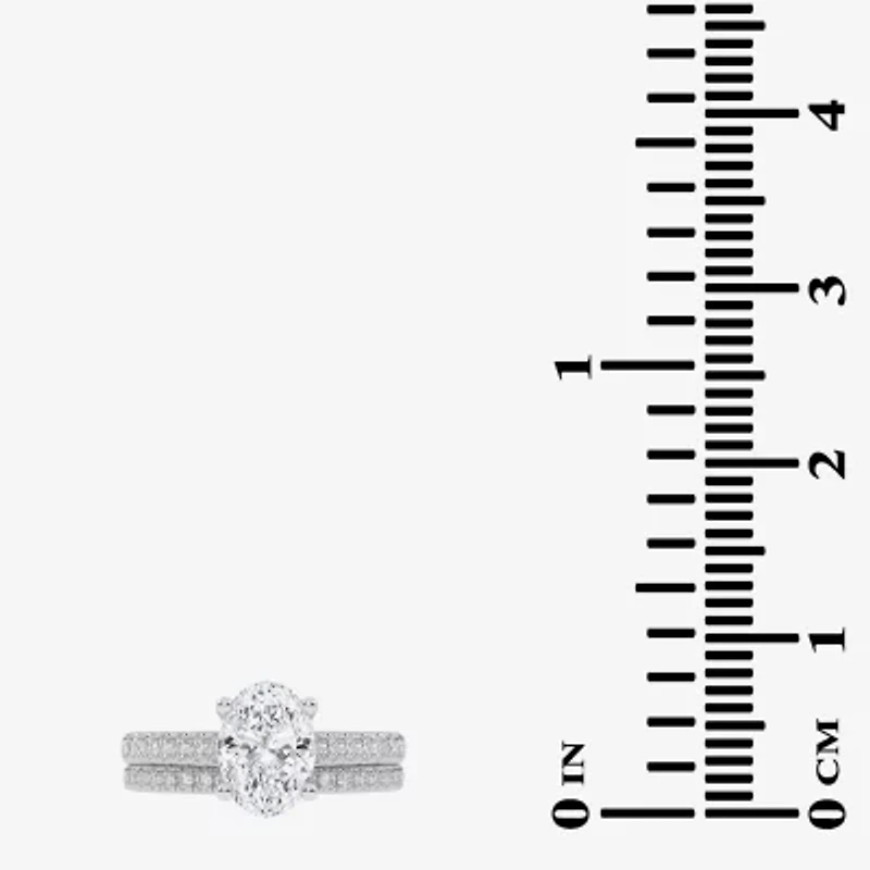 (H-I / Si2-I1) Womens 1 1/2 CT. T.W. Lab Grown White Diamond 10K or 14K Gold Oval Side Stone Bridal Set