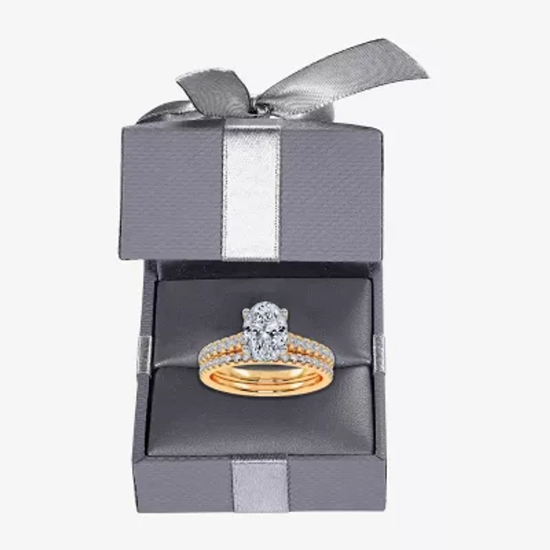 (H-I / Si2-I1) Womens 1 1/2 CT. T.W. Lab Grown White Diamond 10K or 14K Gold Oval Side Stone Bridal Set