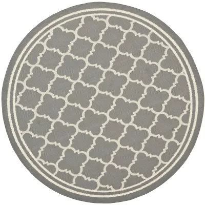 Safavieh Courtyard Collection Crispian Geometric Indoor/Outdoor Round Area Rug