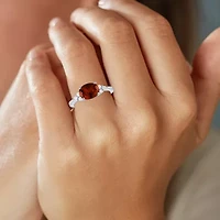 Womens Genuine Red Garnet Sterling Silver Oval Side Stone Cocktail Ring