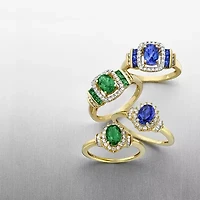 Genuine Gemstone & 1/7 CT. T.W. Diamond 10K Gold Oval Cocktail Ring