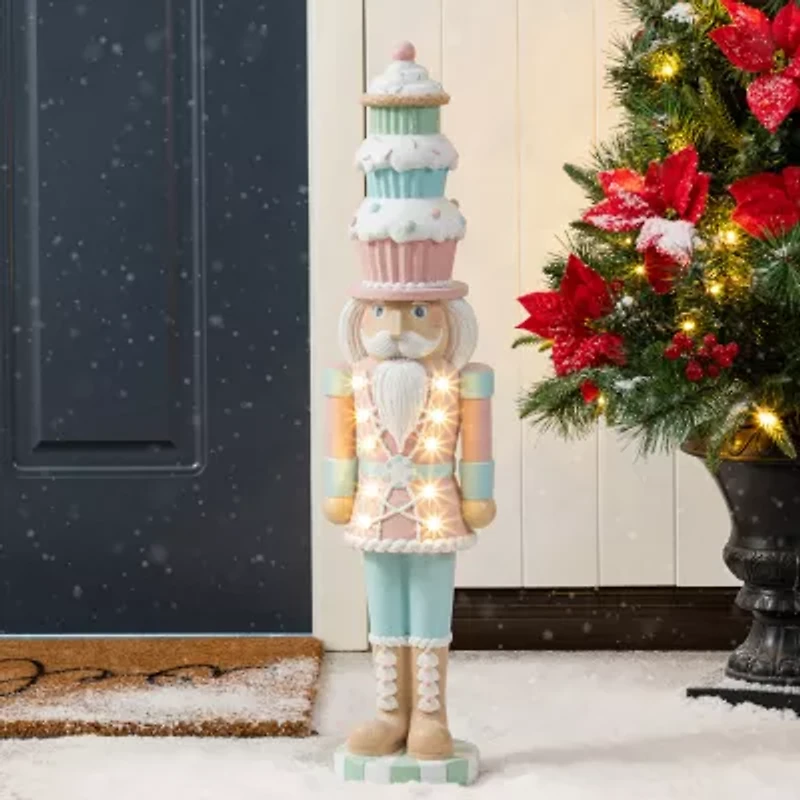 Glitzhome 28"H Lighted Macaron Pink And Blue Resin Christmas Cupcake Christmas Tabletop Decor
