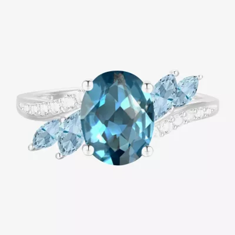 Womens Genuine Blue Topaz Sterling Silver Oval Side Stone Cocktail Ring